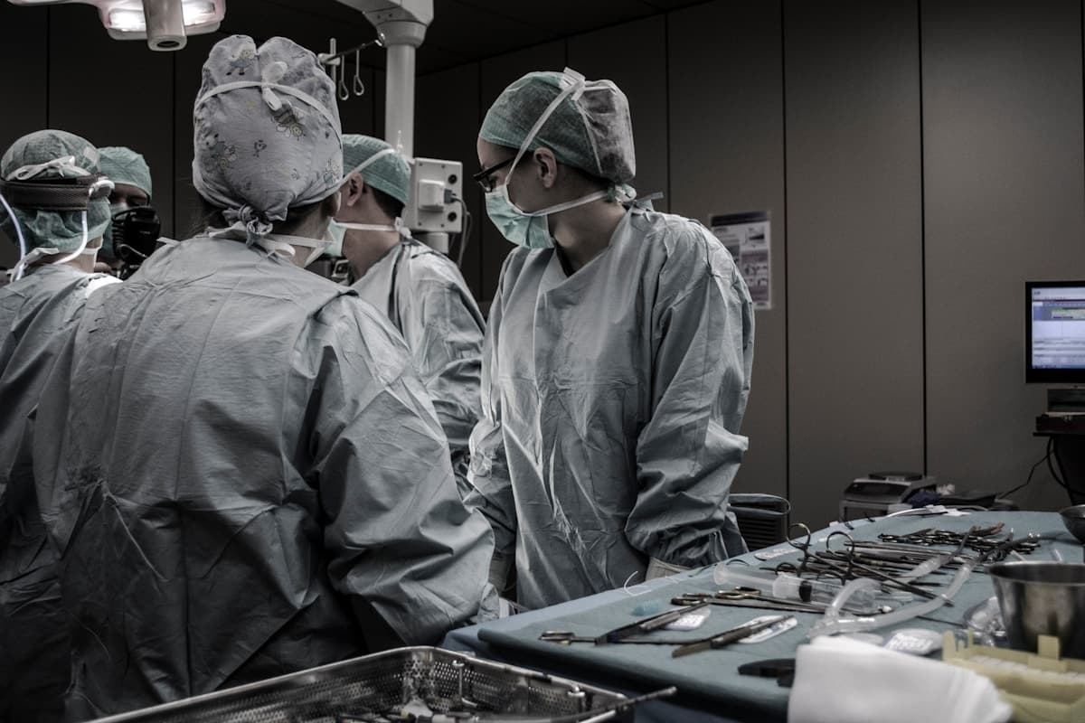 A clinical team at work in an operating theatre