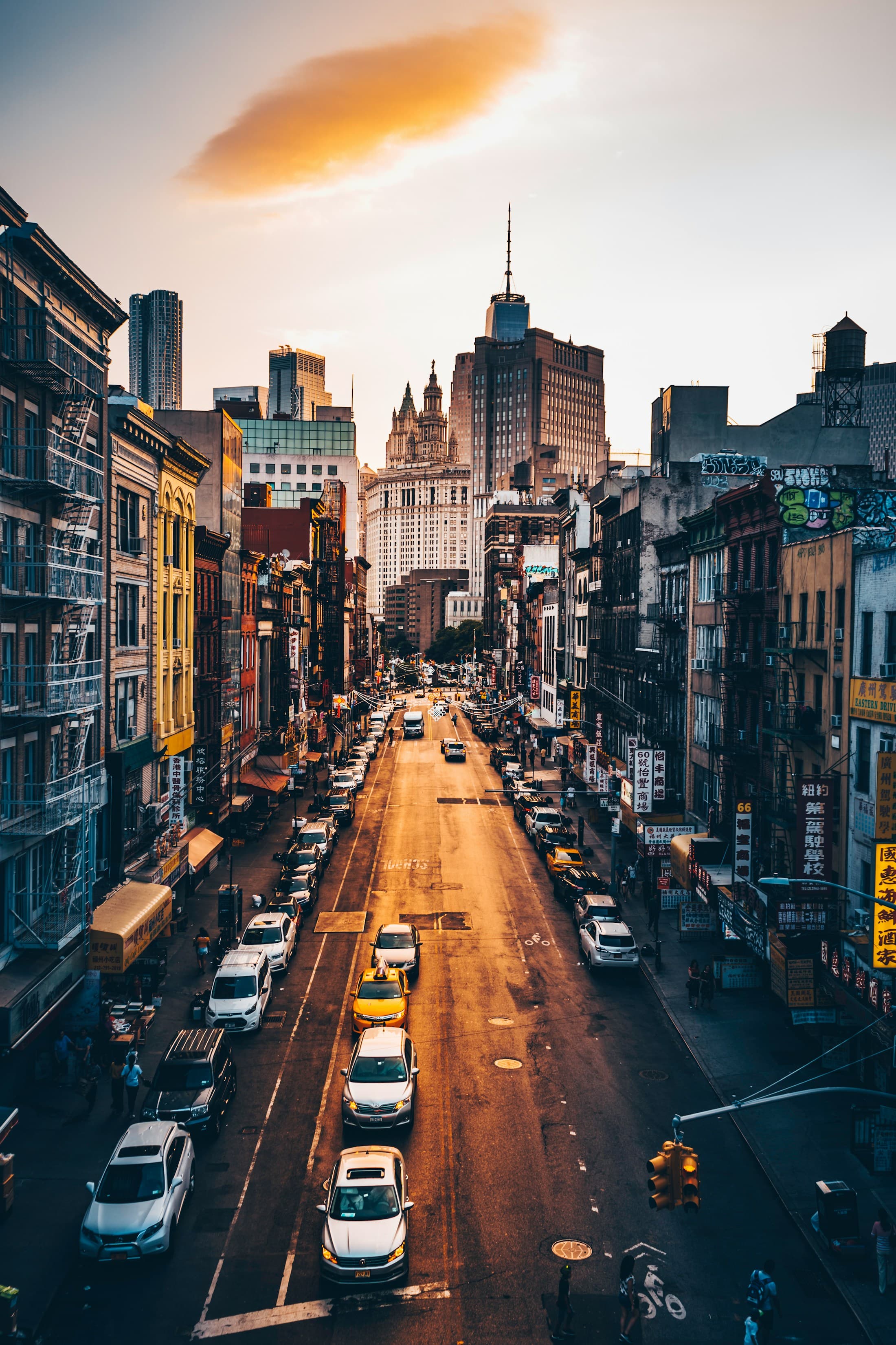 A busy New York City street at golden hour